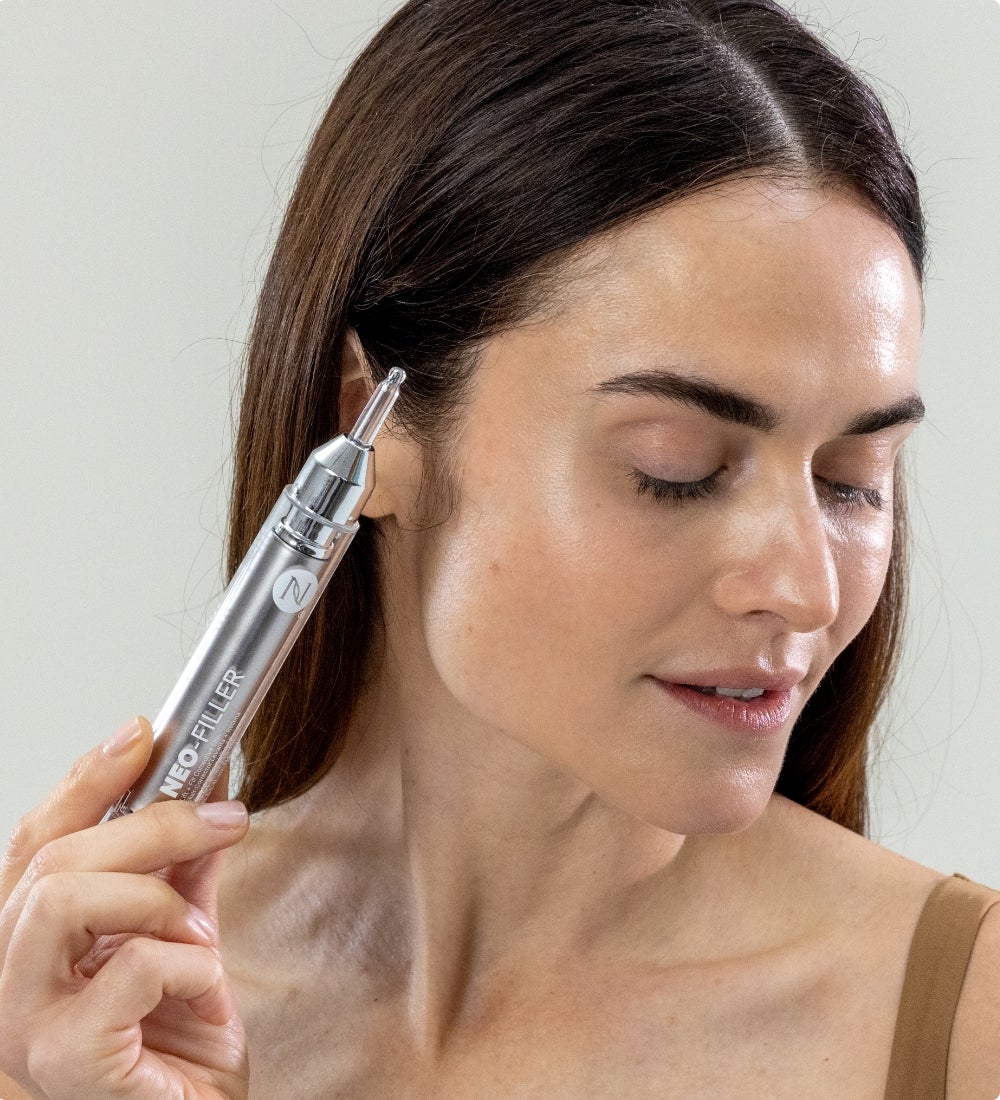 Neo-FILLER SOLD OUT in 5 Days! Featured is a woman holding a Neo-FILLER tube.